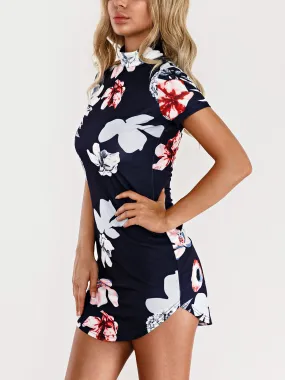 Wholesale Navy Perkins Collar Short Sleeve Floral Print Zip Back Curved Hem Mini Dresses